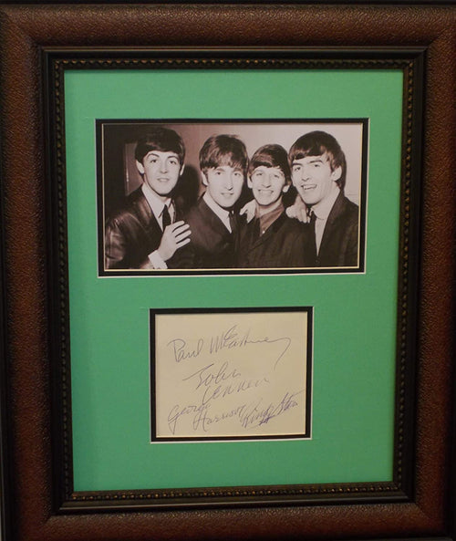 Beatles autographs cut